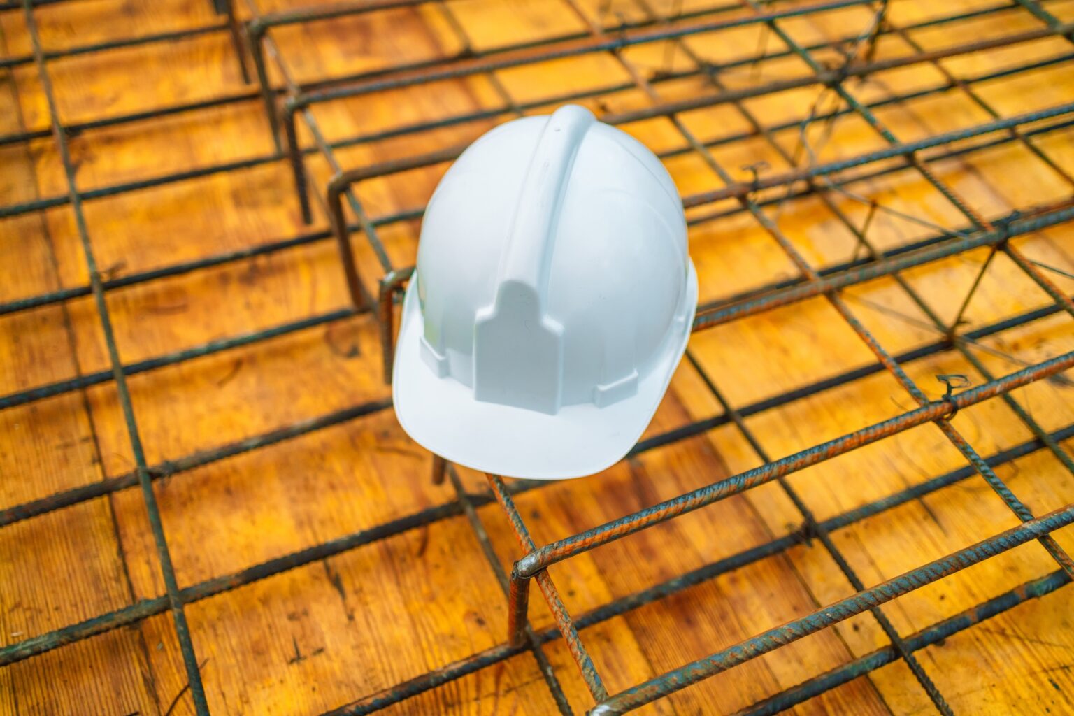 WHITE construction helmet at the construction site